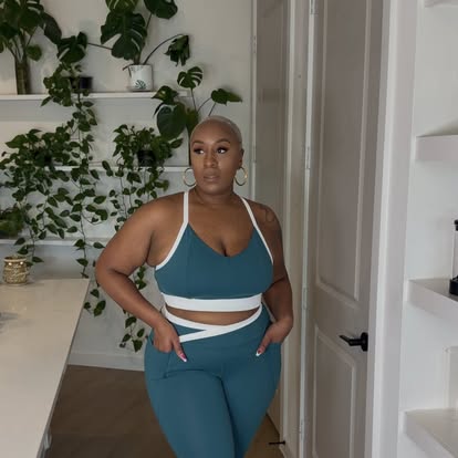 Kai Michelle in a teal activewear set